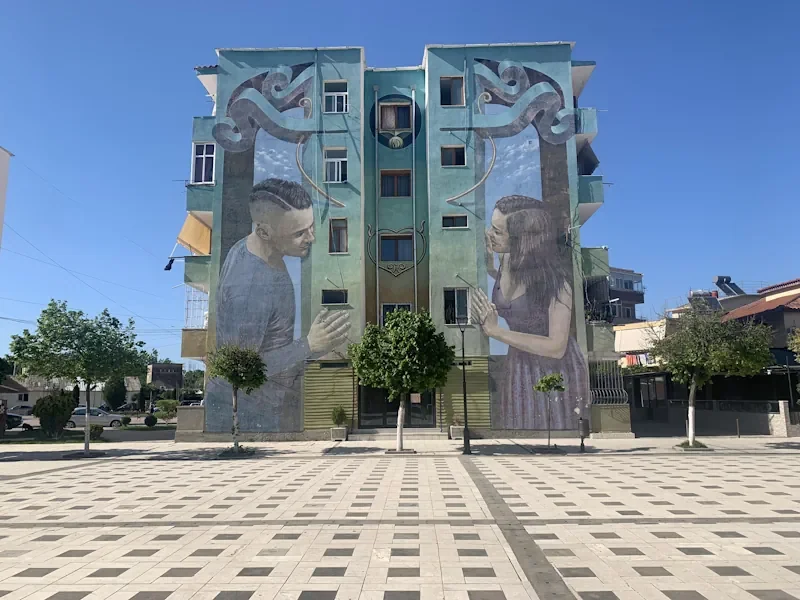 Mural art of a couple by Wild Drawing